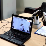 A Robotic Arm Controlled by Eye-gaze for Speech and Motor Impaired